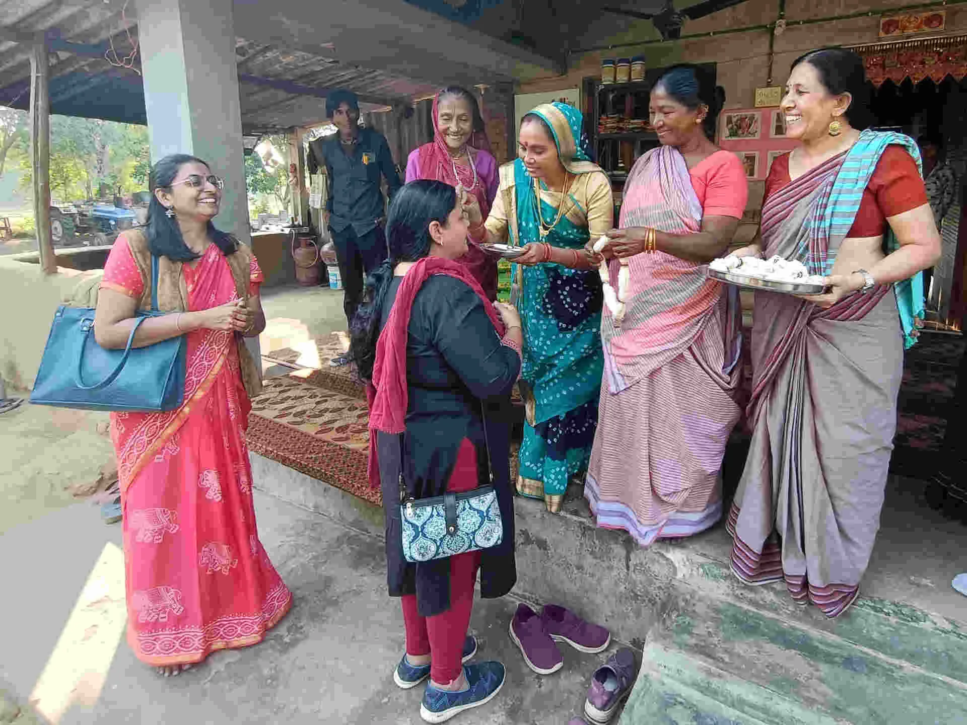 SEWA Visit Smiling women in Gujarat exchanging gifts