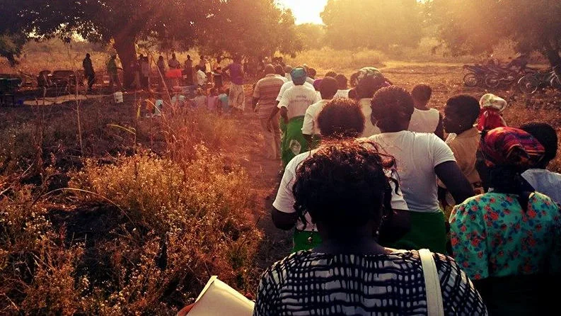 Co-op members in Malawi walking to a meeting